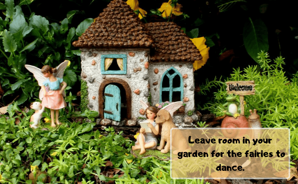 A colorful and cute Fairy Pinecone House with a working door and 2 fairies and a fairy sign.