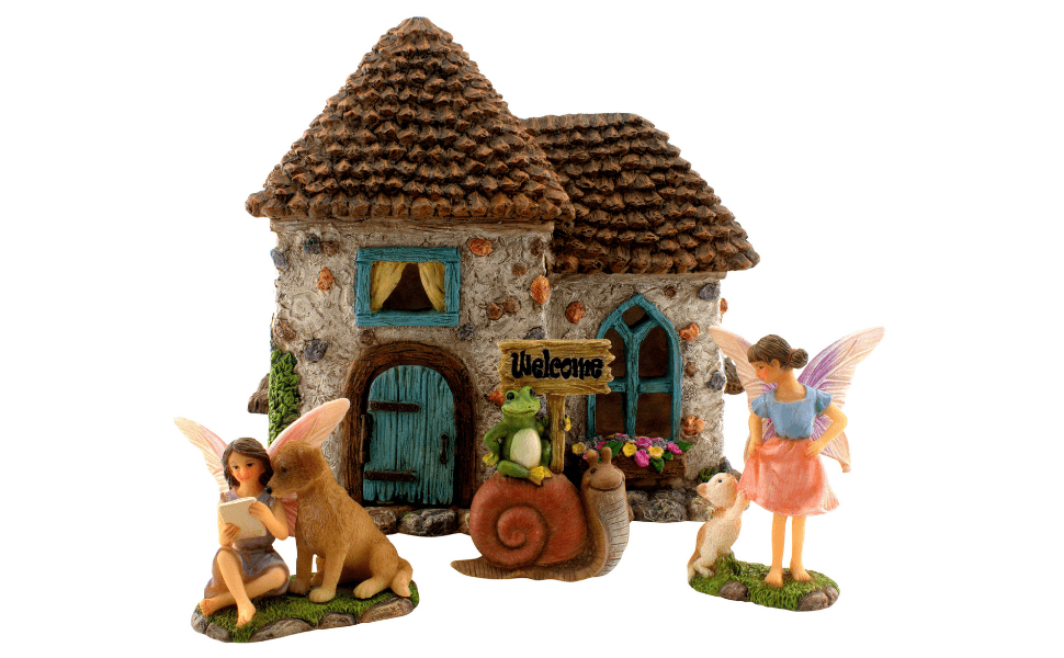 A colorful and cute Fairy Pinecone House with a working door and 2 fairies and a fairy welcome sign.